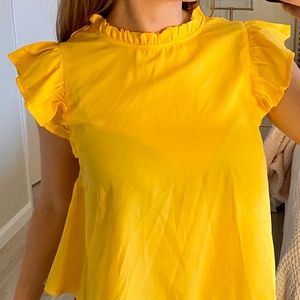 Yellow short sleeve blouse